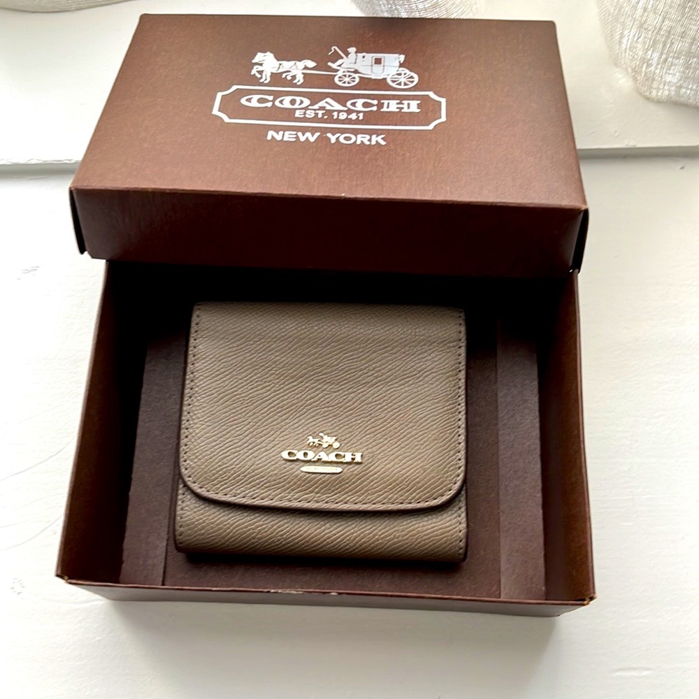 Coach women’s trifold leather wallet